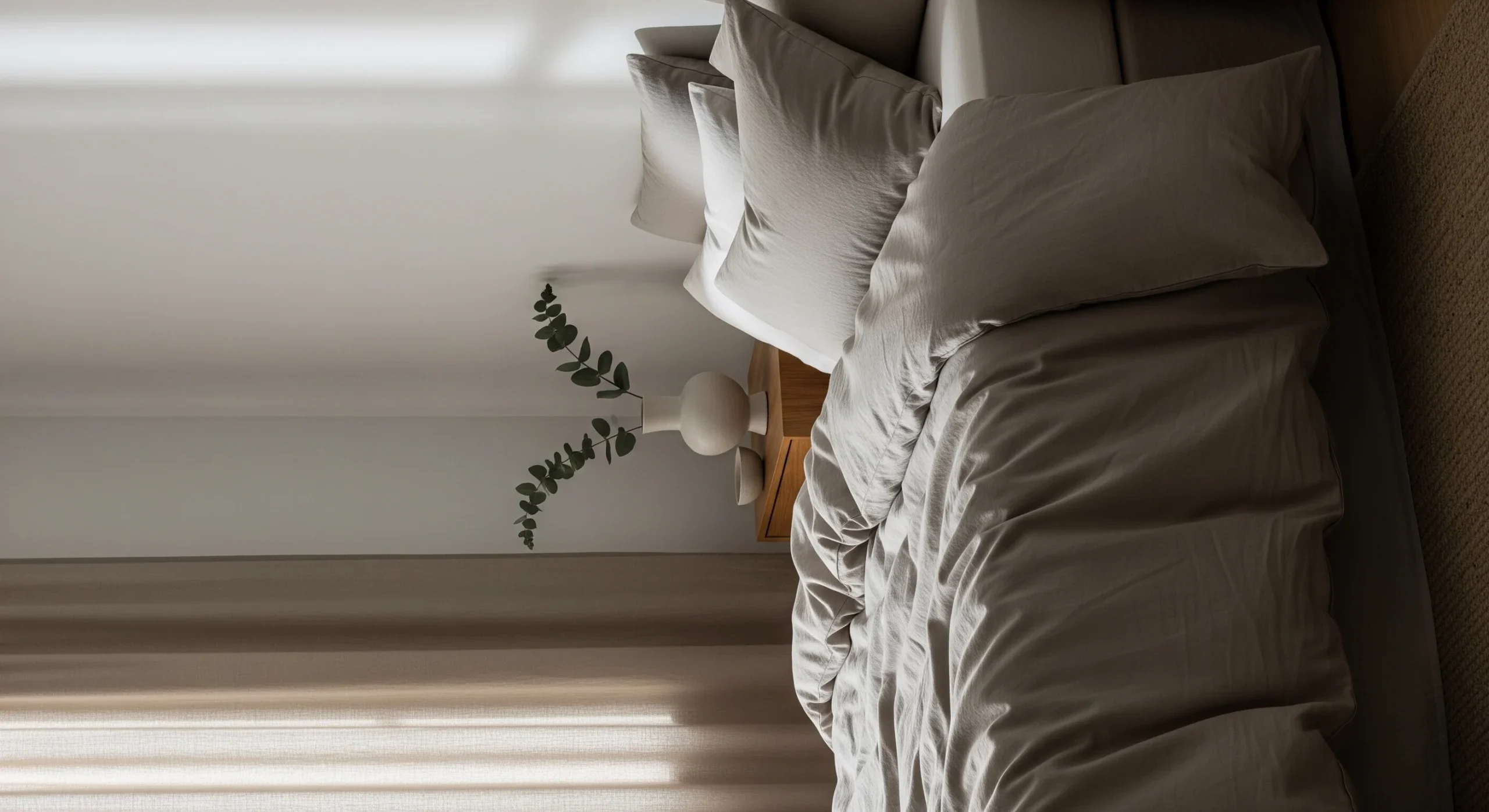 Minimal bedroom setup with neutral bed sheet set designed for comfort in UAE climate