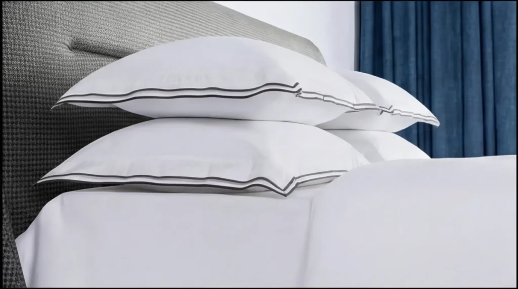 Stacked white cotton pillowcases with breathable fabric ideal for humid UAE weather