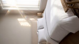 Luxury organic cotton bedding set in a modern UAE bedroom with breathable white sheets and elegant hotel-style finish