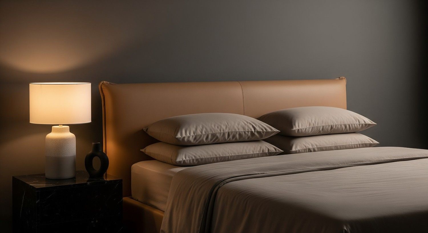 Luxury fitted sheet with stacked pillows on a contemporary bed in a modern UAE bedroom.